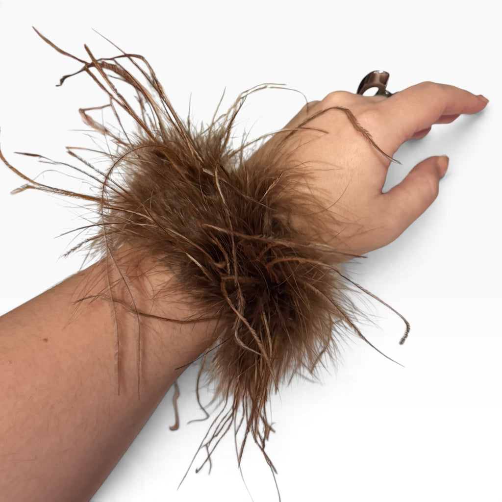 Puño plumas