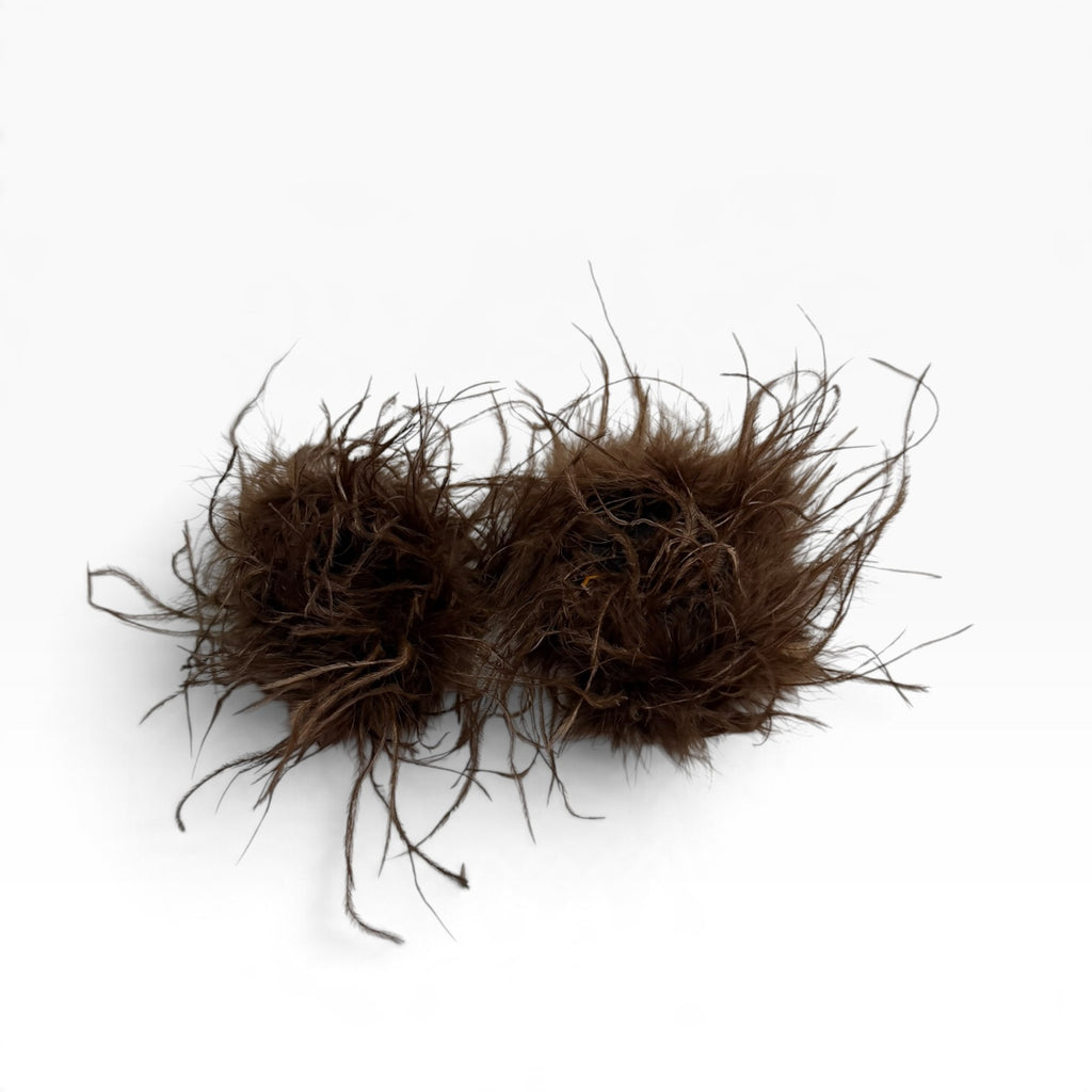 Puño plumas