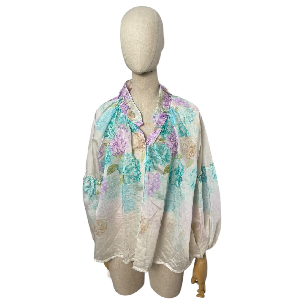 Camisa de flores
